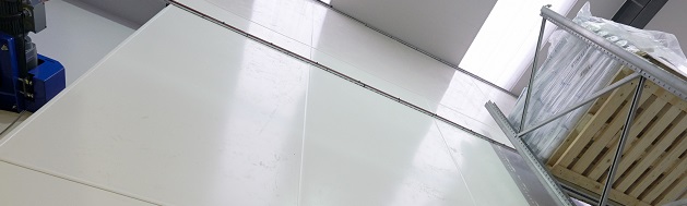 What is the fire performance criteria for wall cladding in the UK?